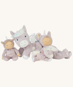 A picture of the Olli Ella unicorn collection toys posed together; a dinkum doll, a dinky doll, a dinkum unicorn, and a baby unicorn