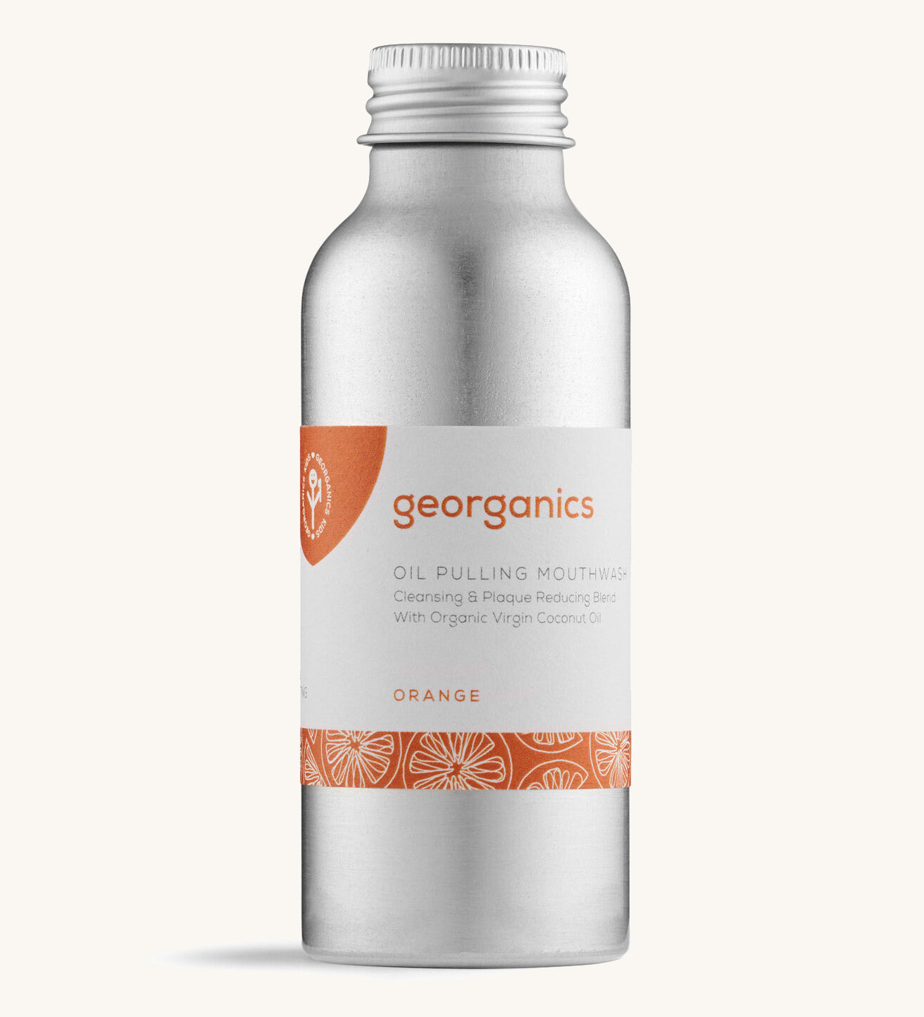 A bottle of the Georganics orange oil pulling mouthwash on a cream background