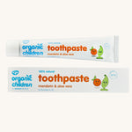 Organic Babies Toothpaste Mandarin & Aloe Vera on a plain background. 