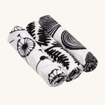 Etta Loves Organic Cotton Baby Muslin Squares 3 Pack - Plant, from left to right is Dandelion, Fern and Tree Ring, in striking black and white print