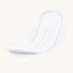 Individual open moderate flow pad on a cream background.