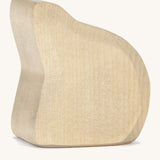 A wooden Ostheimer rock for the Ostheimer sitting mermaid on a cream background.