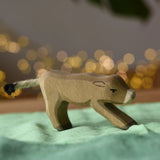Ostheimer alp calf drinking placed on a green cotton play cloth.