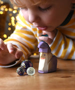 Ostheimer amethyst purple dwarf wooden toy figure.