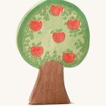 Ostheimer apple tree wooden toy figure on a plain background. The side with apples are shown. 