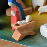 Ostheimer baby jesus wooden toy figure from the nativity set.