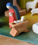 Ostheimer baby jesus wooden toy figure from the nativity set.