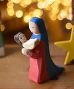 Ostheimer baby wooden toy figure plcaed in the arms of Mary.