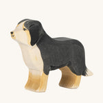Ostheimer Bernese Mountain Dog wooden toy figure on a plain background. 