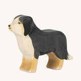 Ostheimer Bernese Mountain Dog wooden toy figure on a plain background. 
