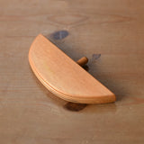 Ostheimer bird perch for nativity stable placed on a wooden surface. 