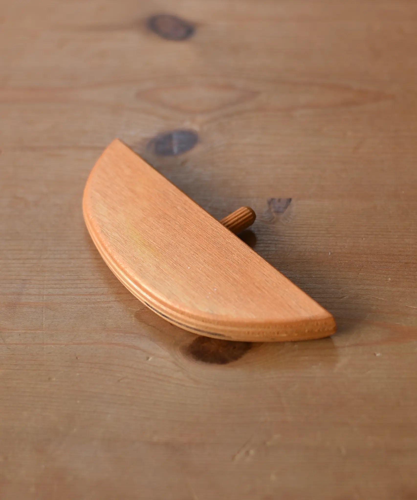 Ostheimer bird perch for nativity stable placed on a wooden surface. 