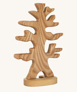 Ostheimer bird tree with support on a plain background. 