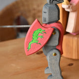 Ostheimer black riding knight handmade wooden toy figure with shield and long sword.