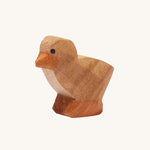 Ostheimer dark chick figure on a plain background. 
