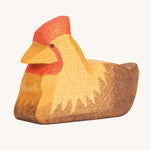 Ostheimer Brown Hen on Nest figure on a plain background. 