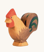 Ostheimer Brown Rooster wooden toy figure on a plain background. 
