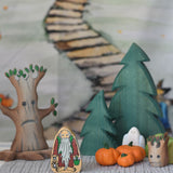 A selection of wooden toys from various brands set up in a small world play scene set up with the Lanka Kade Hermit figure at the front.
We stock a wide range of wooden toys from various brands such as Lanka Kade, Ostheimer, Bumbu and more here at Babipur. 
