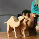 Ostheimer dromedary camel placed on a wooden surface.