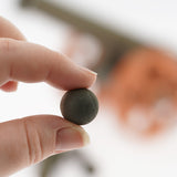 One of the cannon balls from the Ostheimer Large Cannon set being hed