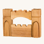 Ostheimer children's handmade wooden castle gate and towers set on a cream background