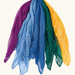 Ostheimer Christmas Decoration Scarves in a set of 5 scarves all with different colours on a plain background. The scarves are purple 2 different blue tones, a dark green and a yellow. 