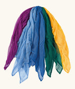 Ostheimer Christmas Decoration Scarves in a set of 5 scarves all with different colours on a plain background. The scarves are purple 2 different blue tones, a dark green and a yellow. 