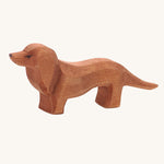 Ostheimer Dachshund dog toy figure on a plain background. 