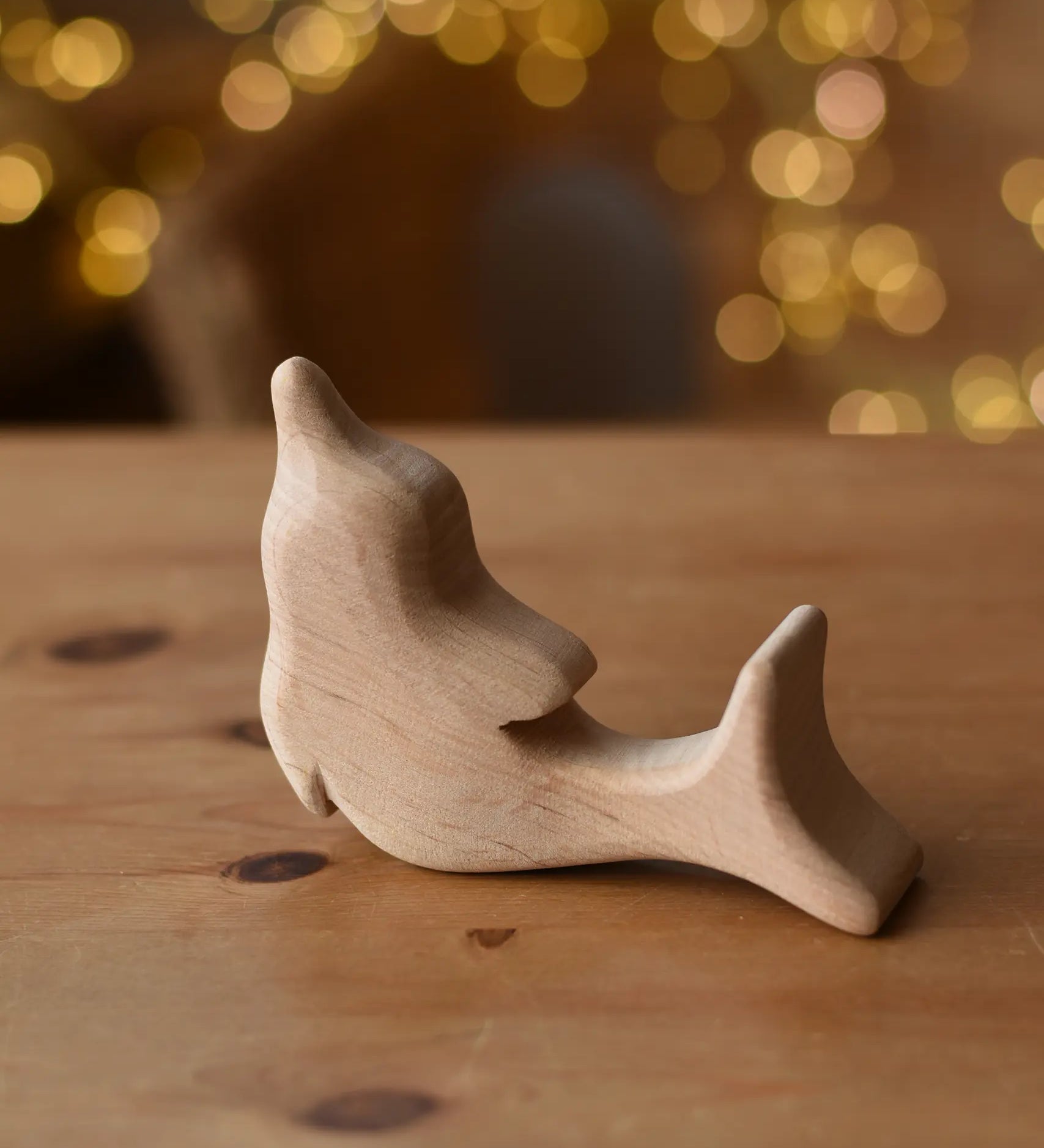 Ostheimer dolphin natural wooden rabbit wooden toy figure.