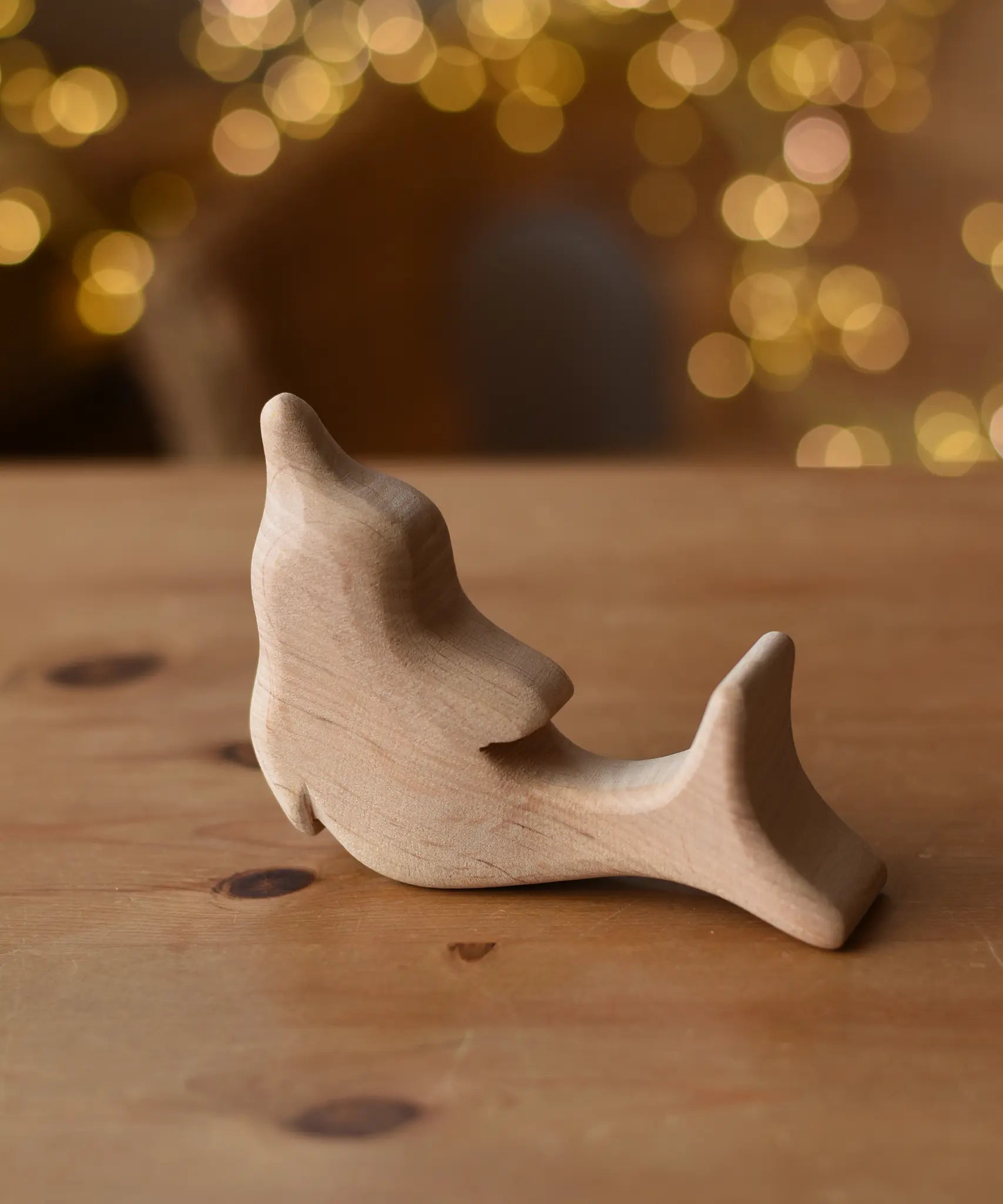 Ostheimer dolphin natural wooden rabbit wooden toy figure.