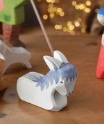 Ostheimer donkey wooden toy from the nativity set with cardboard diorama scene. 