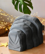 Back of the Ostheimer dragon's cave placed on a wooden surface. 