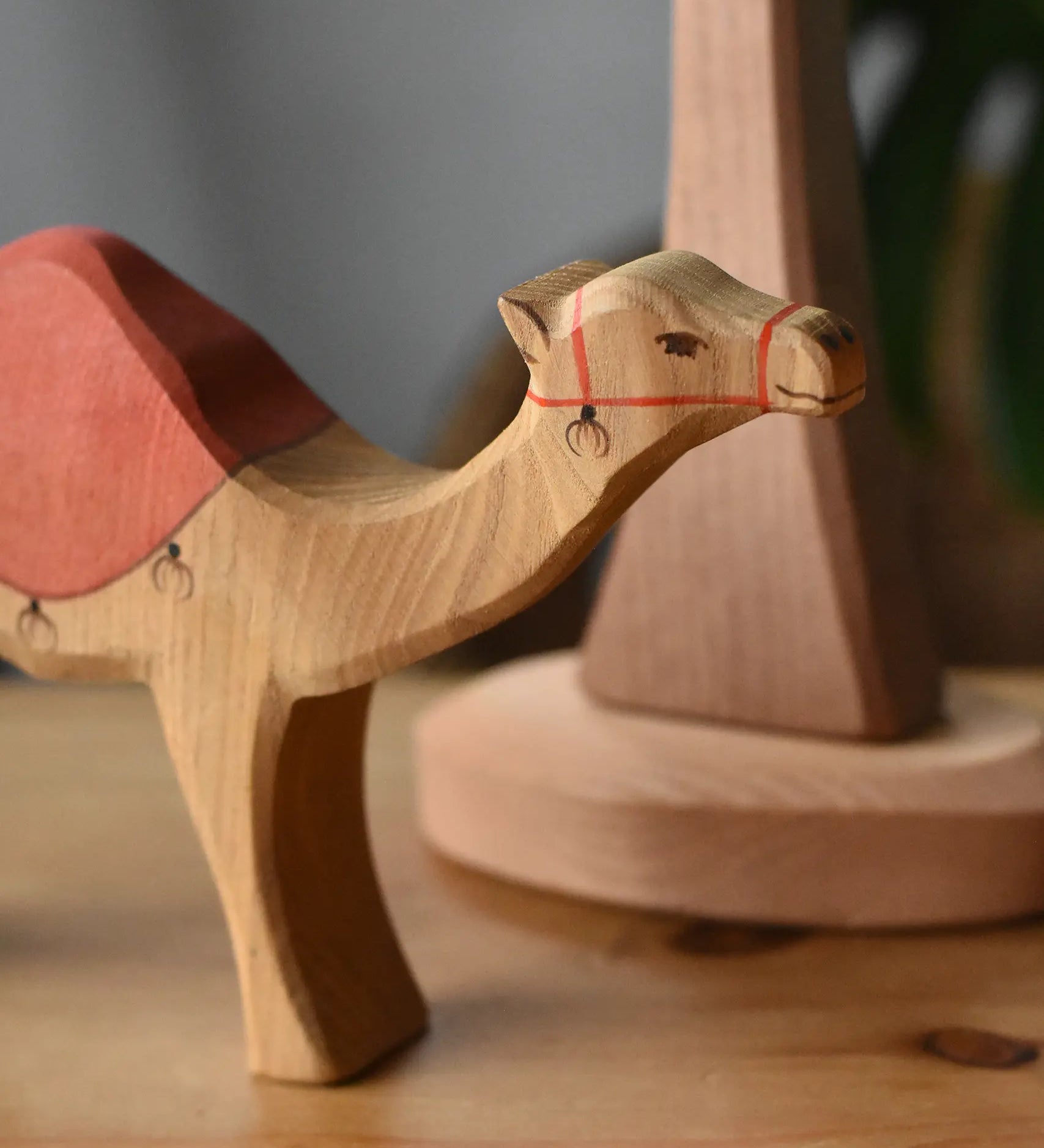 Ostheimer dromedary camel figure with saddle, close up of the face.