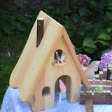 An Ostheimer fairy tale dolls house with a medieval princess stood in the door way and a cat on the bird perch.
These wooden figures are part of a large range of expertly hand crafted, Waldorf inspired, wooden toys here at Babipur. 