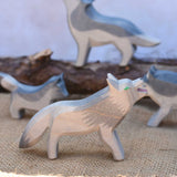 An Ostheimer fairy wolf , a grey coloured wolf with green eyes. This wooden toy wolf is the oldest of the Ostheimer wolves and a bit rugged in his design. This figure is perfect for use in fairy tales such as the little red riding hood. Check out our full range of expertly crafted wooden toy figures and scenery here at Babipur.