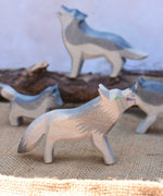 An Ostheimer fairy wolf , a grey coloured wolf with green eyes. This wooden toy wolf is the oldest of the Ostheimer wolves and a bit rugged in his design. This figure is perfect for use in fairy tales such as the little red riding hood. Check out our full range of expertly crafted wooden toy figures and scenery here at Babipur.
