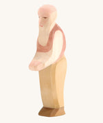 Ostheimer Grandfather wooden toy figure on a plain background. 