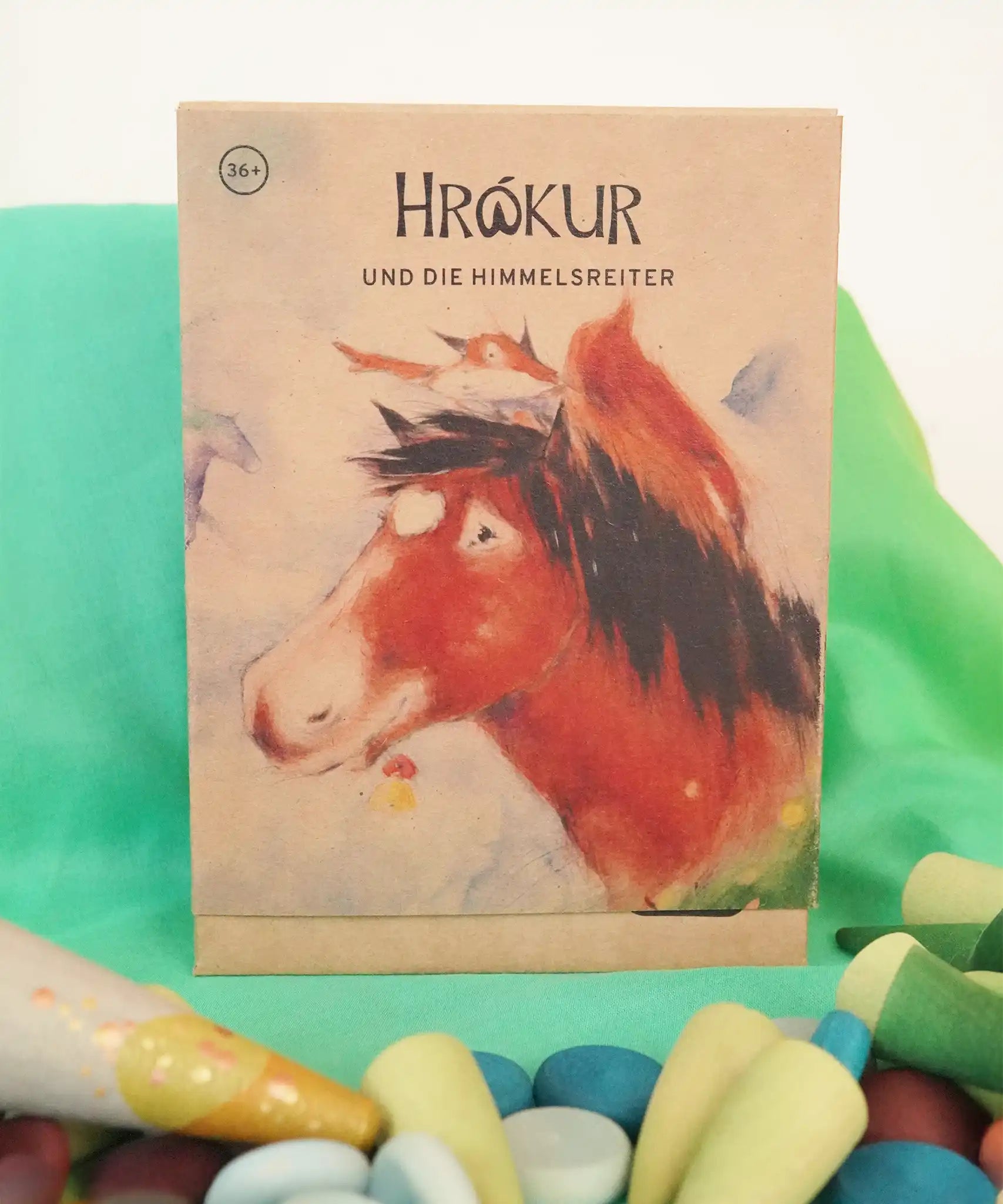 Grapat x Ostheimer Hrókur Mandala Pieces Set Wooden Toy cardboard packaging featuring an illustration of the brown horse on the front.