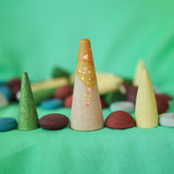 Close up of the pieces included in the Grapat x Ostheimer Hrókur Mandala Pieces wooden toy set.