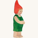 The Ostheimer hand made wooden 'Pepe' character figure from the German story “Pepe and Sumselinchen”. He has green overalls and a pointy red hat.