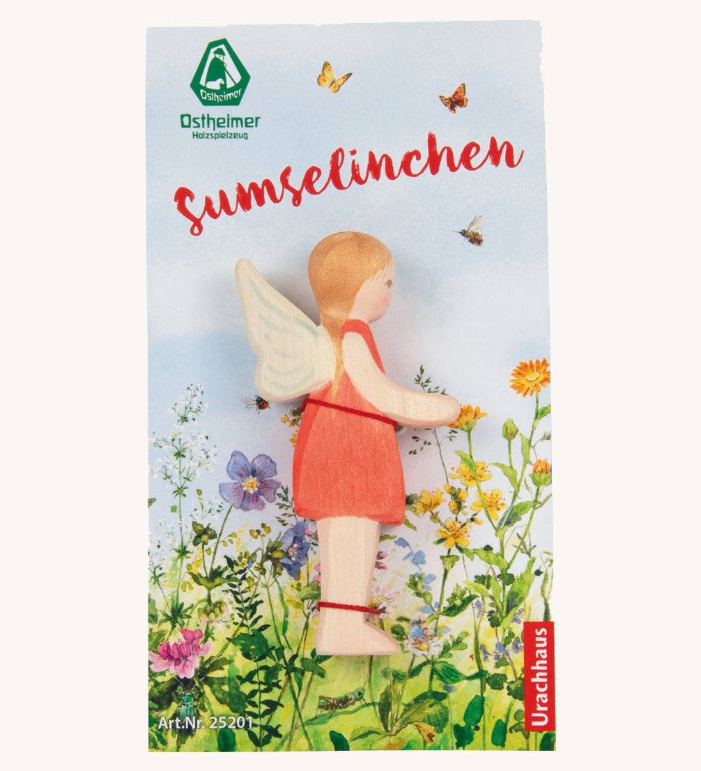 The Ostheimer hand made wooden 'Sumselinchen' character figure from the German story “Pepe and Sumselinchen”, in special floral packaging.