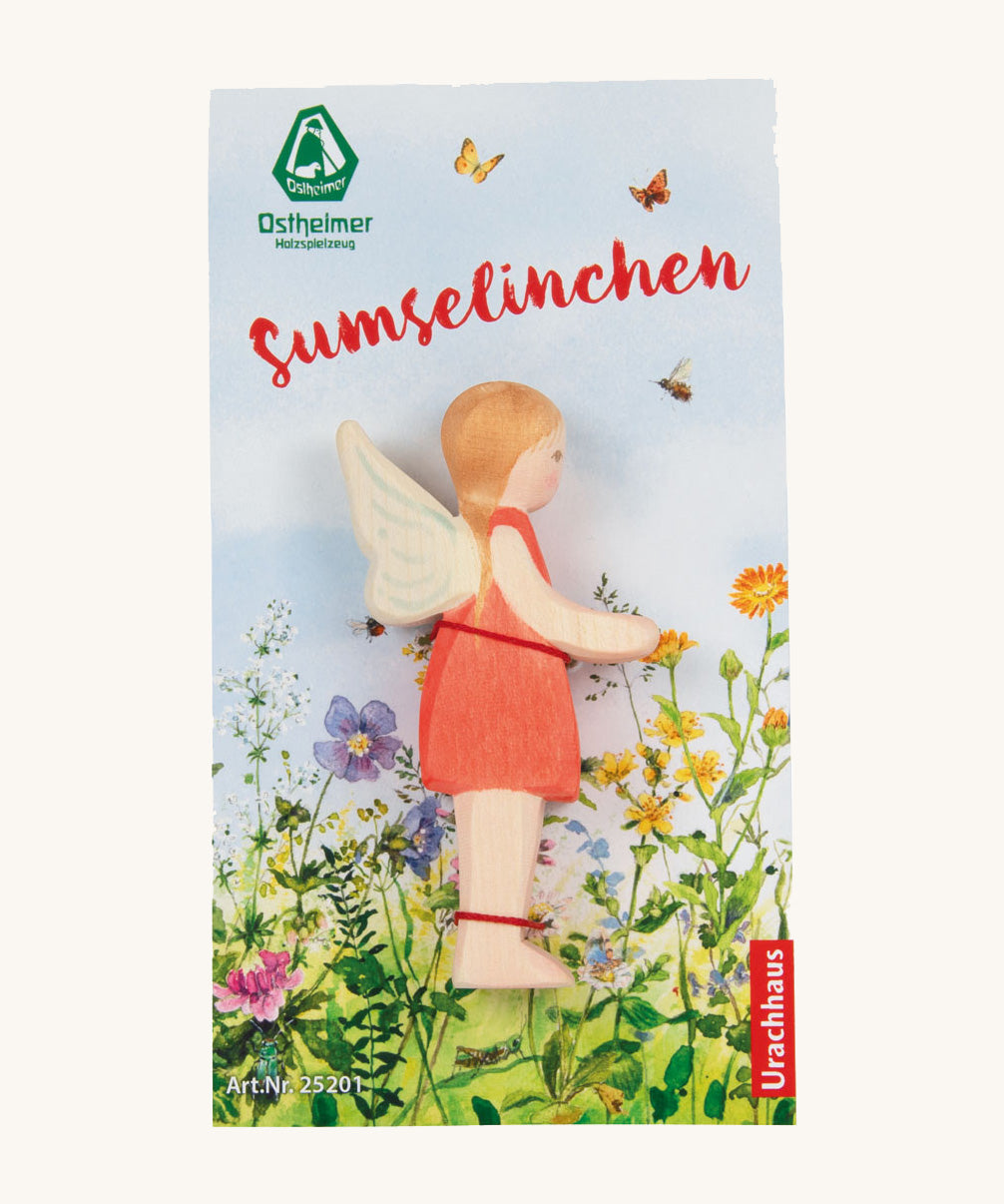 The Ostheimer hand made wooden 'Sumselinchen' character figure from the German story “Pepe and Sumselinchen”, in special floral packaging.