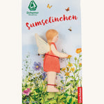 The Ostheimer hand made wooden 'Sumselinchen' character figure from the German story “Pepe and Sumselinchen”, in special floral packaging.