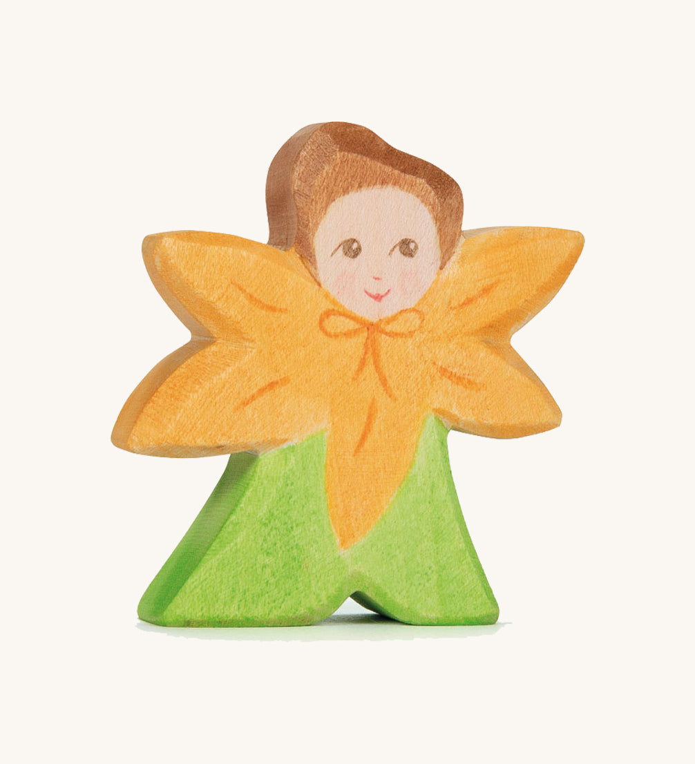 The Ostheimer hand made and hand painted wooden Calendula Flower Child figure toy.