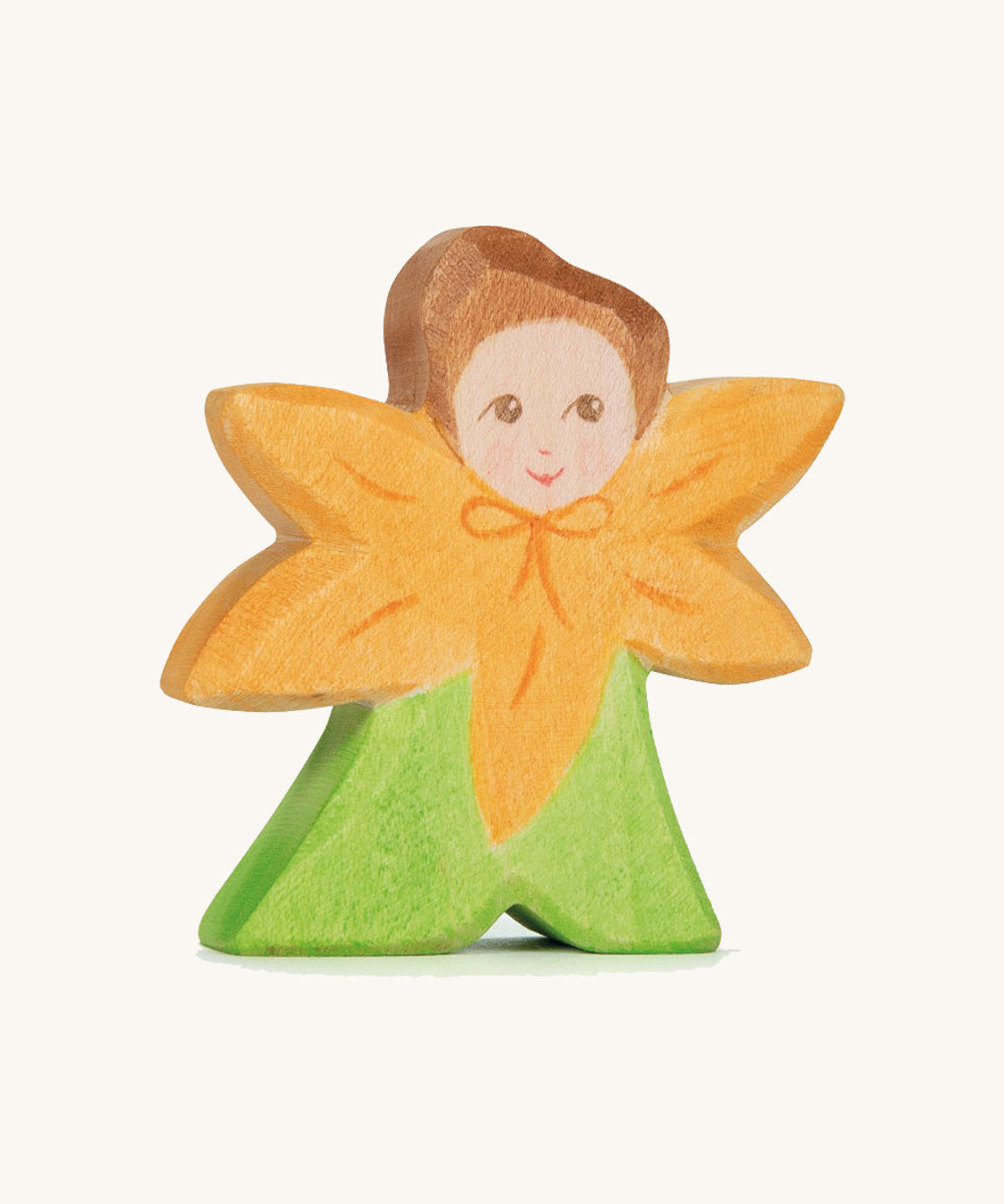 The Ostheimer hand made and hand painted wooden Calendula Flower Child figure toy.