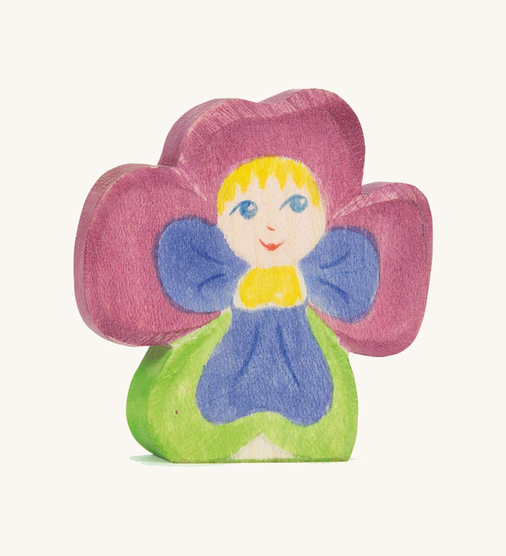 The Ostheimer hand made and hand painted wooden Pansy Flower Child figure toy.