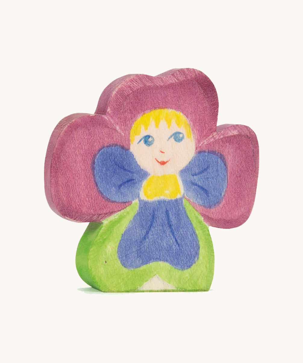 The Ostheimer hand made and hand painted wooden Pansy Flower Child figure toy.