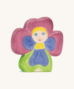 The Ostheimer hand made and hand painted wooden Pansy Flower Child figure toy.
