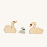 Three Ostheimer hand made wooden swan figures.