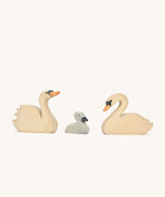 Three Ostheimer hand made wooden swan figures.